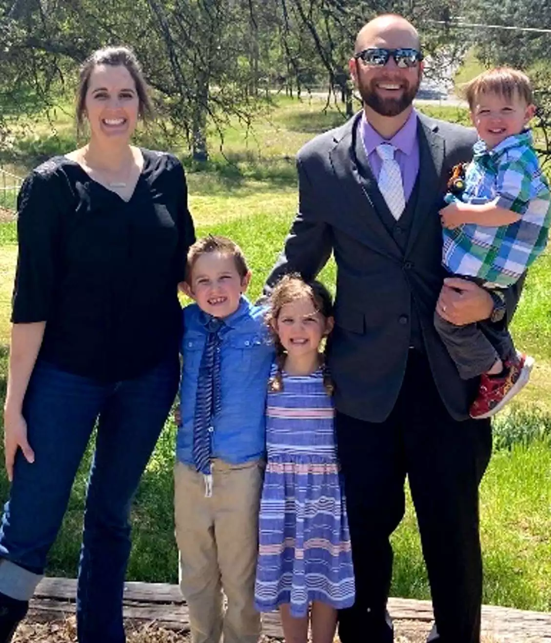 Greg Kilgore, Associational Missions Strategist, standing outdoors with his family